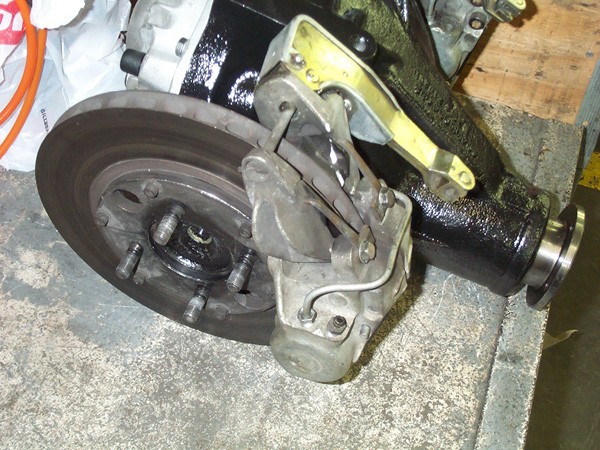 Rotor uses a aluminum hat to mount it to the axle